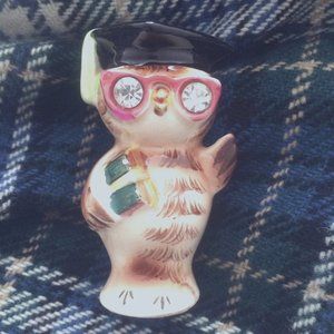 Vintage ceramic owl with graduation hat and diploma